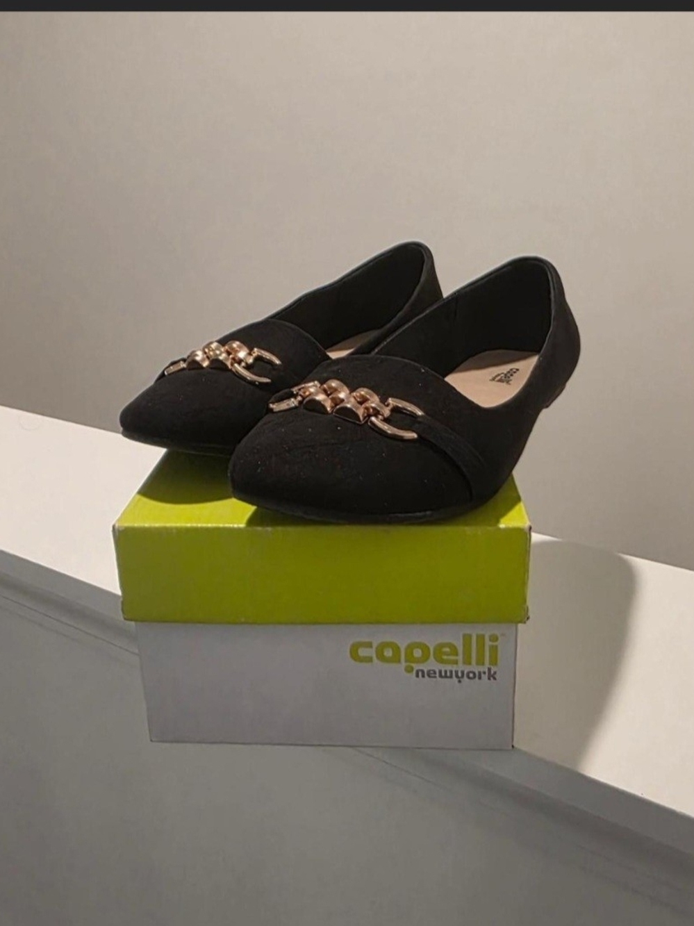 Capelli of New York Black Pointed Toe Flats with Gold Chain Accent